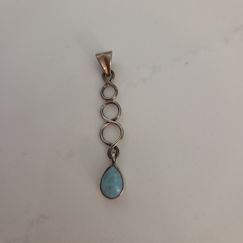 Elegant Silver Pendant with Blue Stone